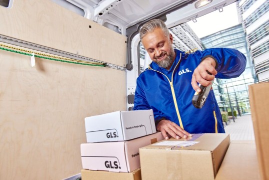 a courier scaning a parcel